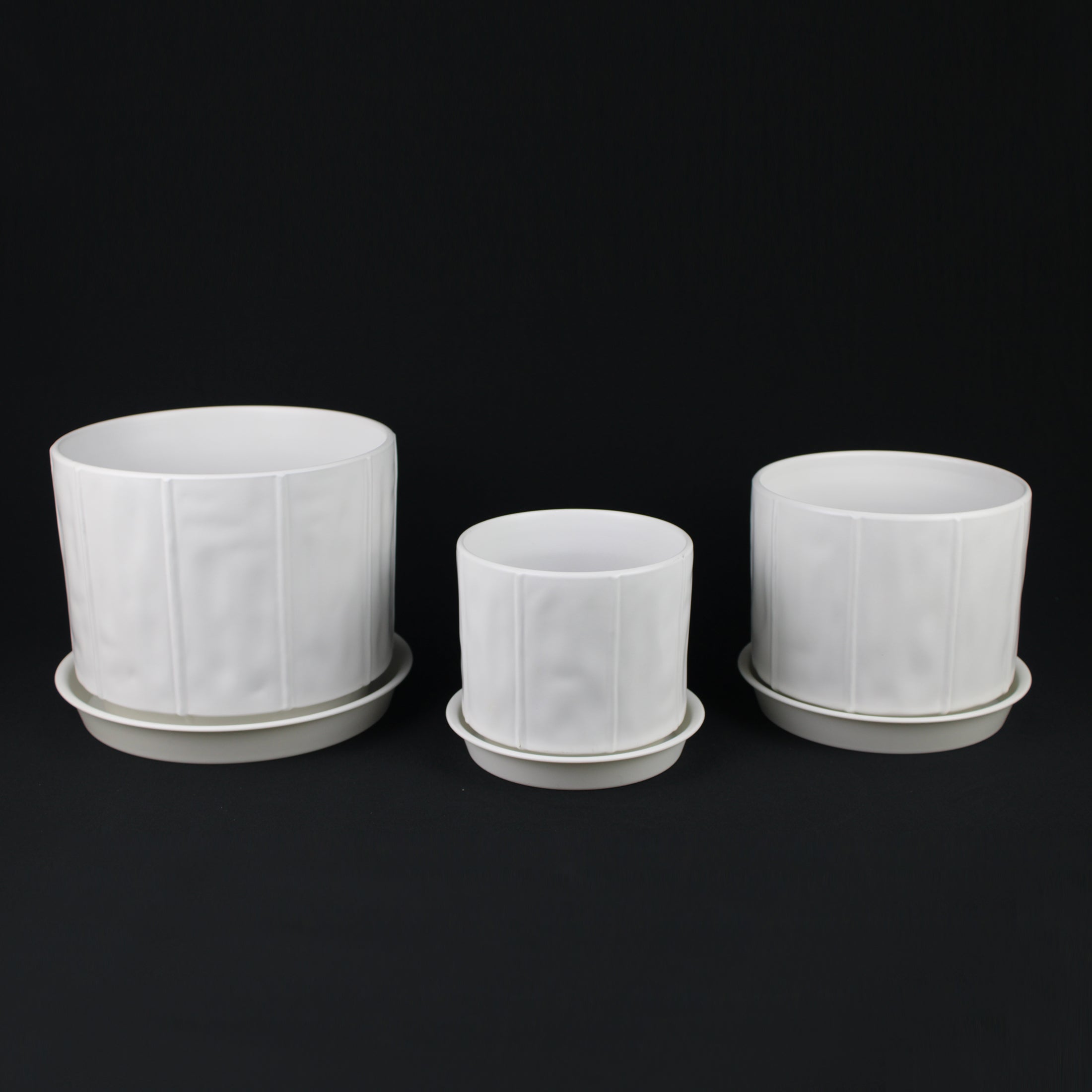 3-Piece White Stoneware Planter Pot Set with Soft Vertical Texture