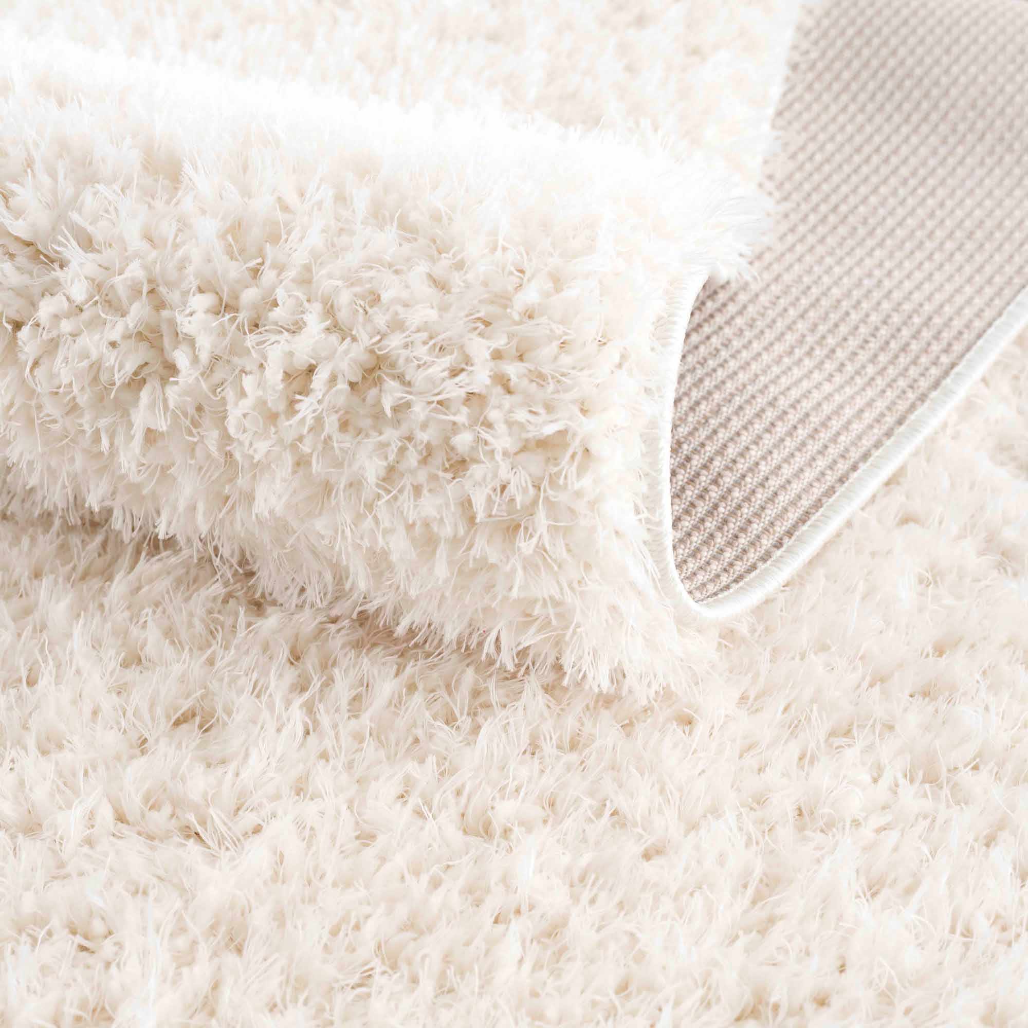 Faina Solid Cream Shag Washable Area Rug