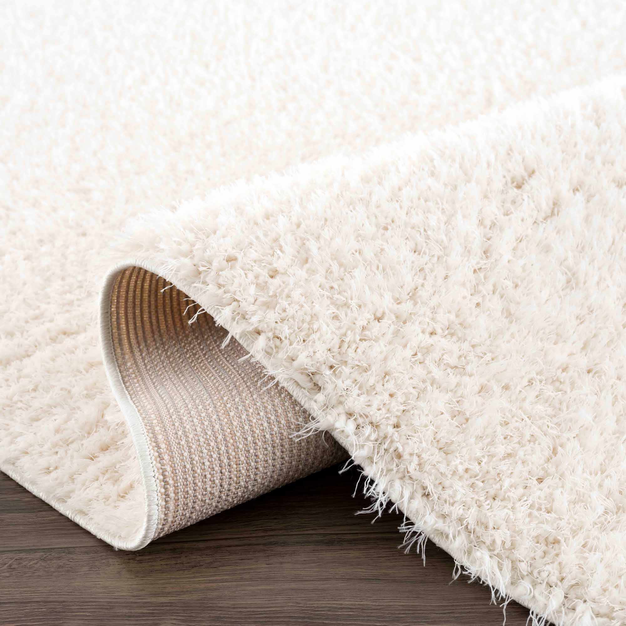 Faina Solid Cream Shag Washable Area Rug
