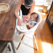 TruBliss® 2-in-1 Turn-A-Tot Highchair with 360° swivel